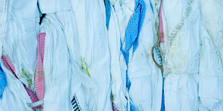 Bilde av gjødsel- og såkornsekker.